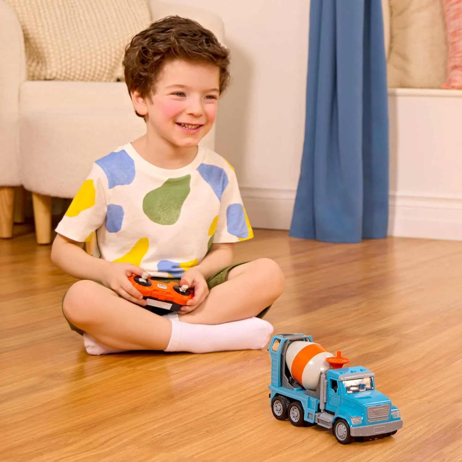 Driven by Battat – 1:24 Scale Remote Control Cement Truck – R/C Toy Cement Mixer – Toy Construction Vehicle for Kids 3 Years   – Lights and Sounds – Movable Parts